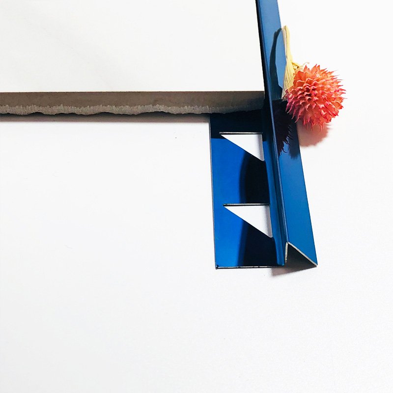 T-profile stainless steel trim used as expansion joint