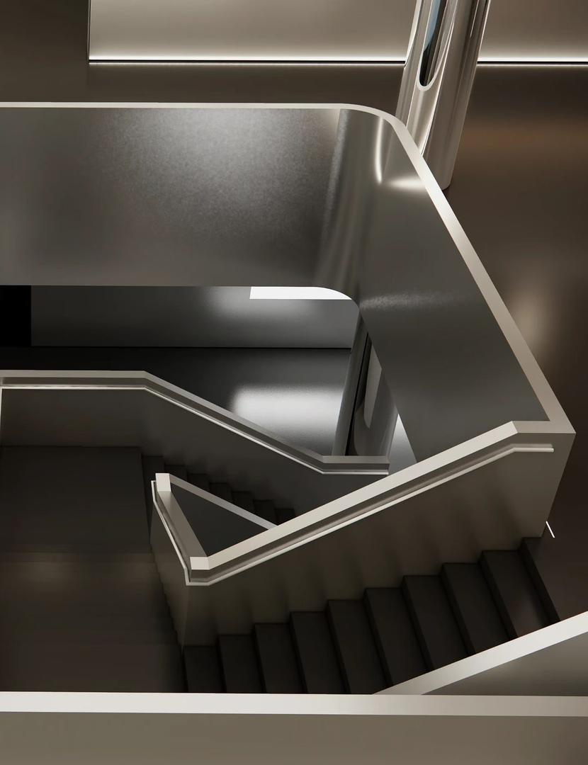 Detail of a folded stainless steel soffit with radiused corners and recessed white LED strip lines in a showroom ceiling