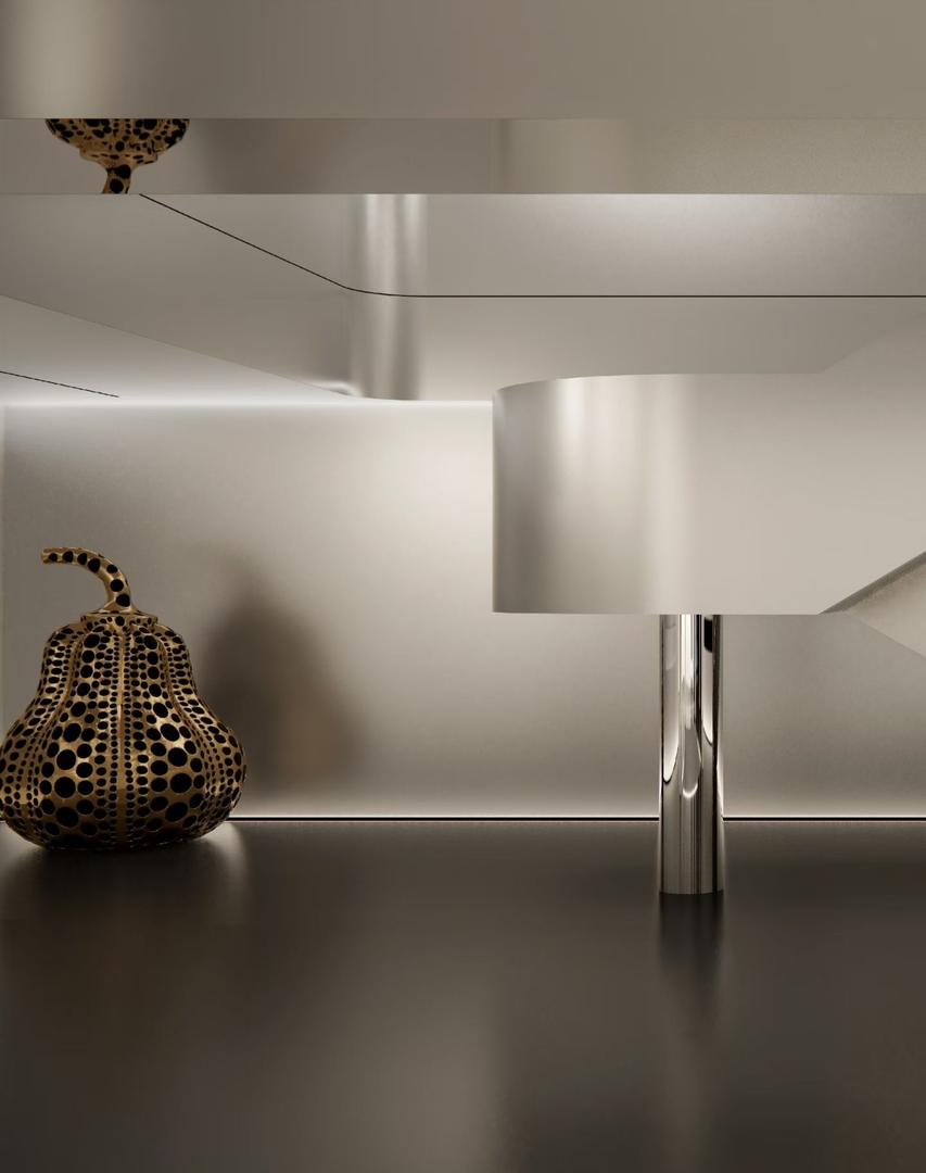 Curved apple sand stainless steel partition in a showroom with a mirrored ceiling reflecting a gold sculpture and a mirror polished column