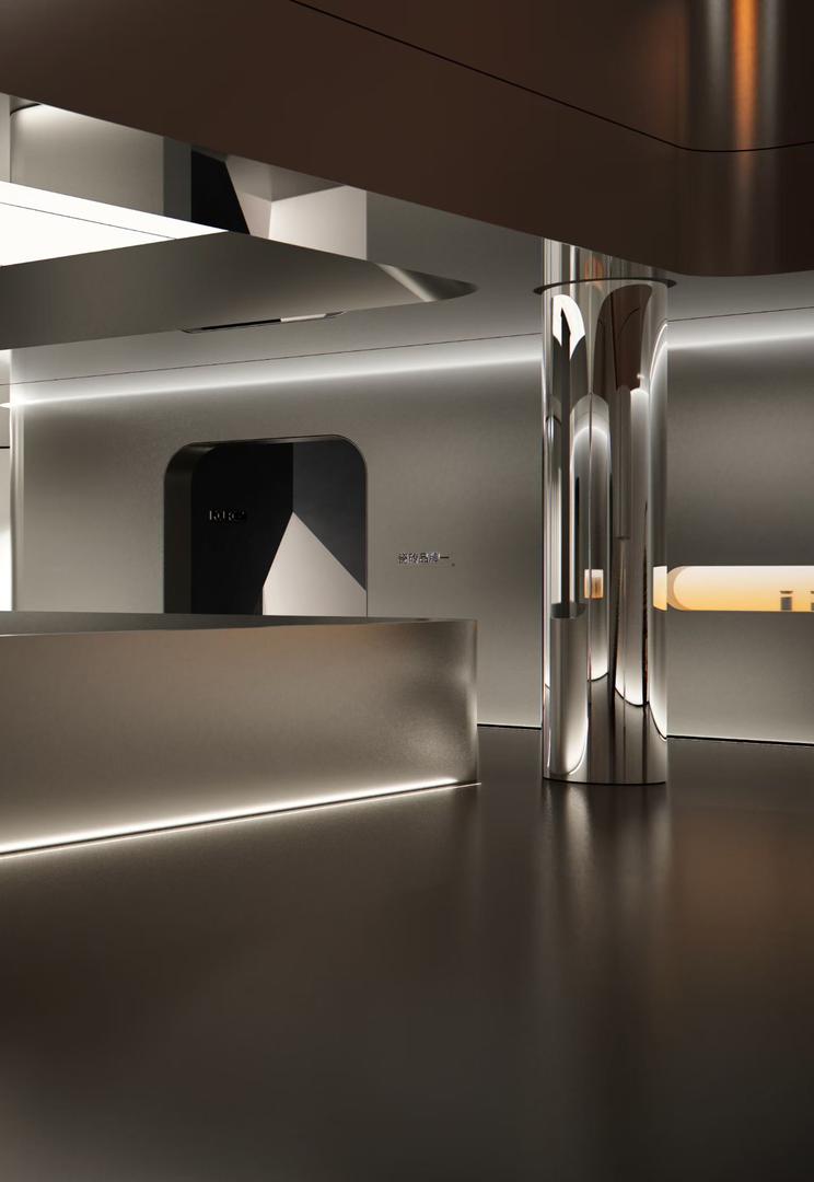 Brushed stainless steel reception desk with LED glow at its base, a mirror polished column and a backlit portal in a luxury showroom